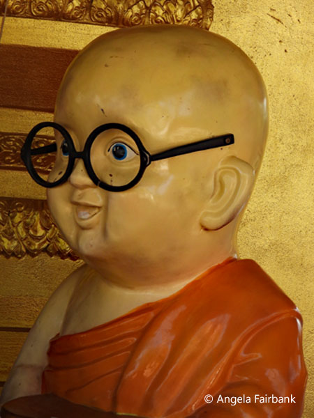 buddha with glasses