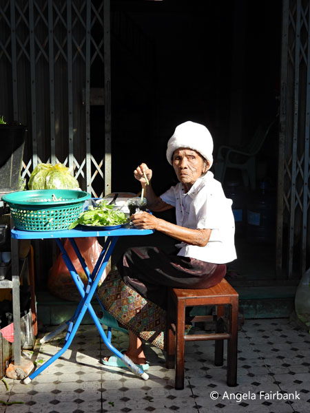 old woman eating breakfast 1