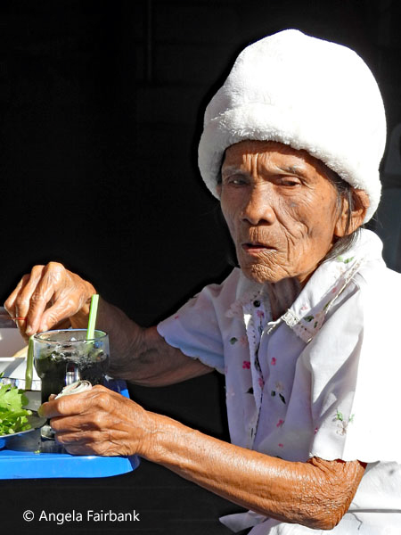 old woman eating breakfast 2