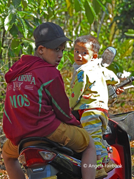 boys on motorcycle
