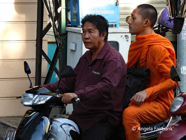 monk on motorcycle