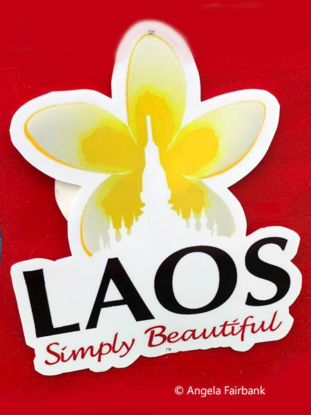 laos ad with national flower frangipani