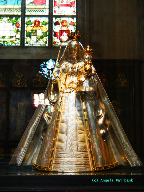 silver Mary statue in cathedral