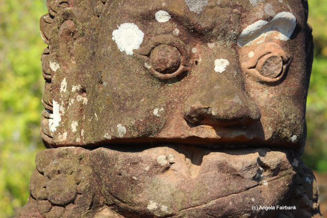 Stone head on bridge toward Bayon 1