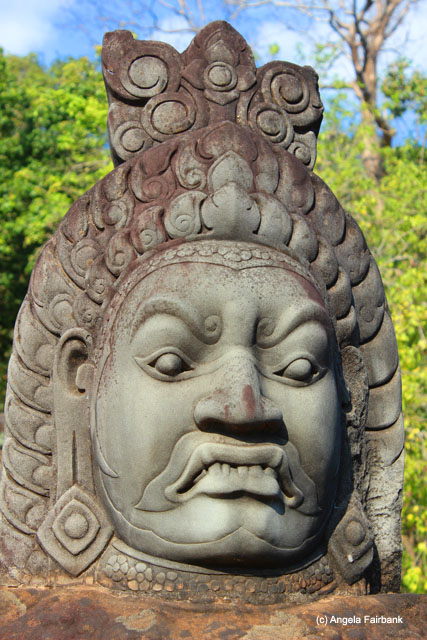 Stone head on bridge toward Bayon 2