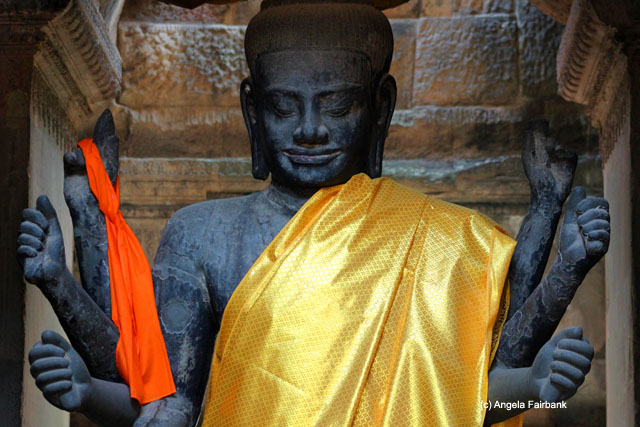 Eight-armed Vishnu inside Angkor Wat entry tower