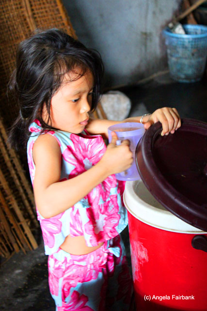 girl at rice cracker factory