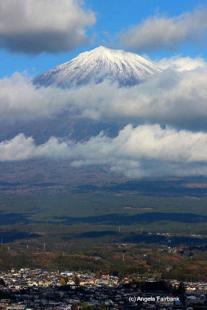mt fuji emerges from the clouds