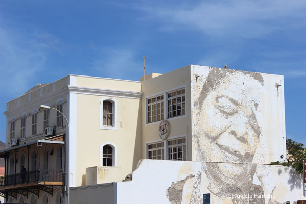 cesaria face on building wall