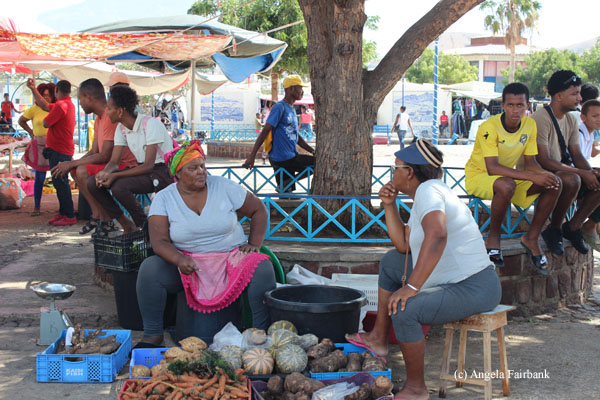 women at outdoor market