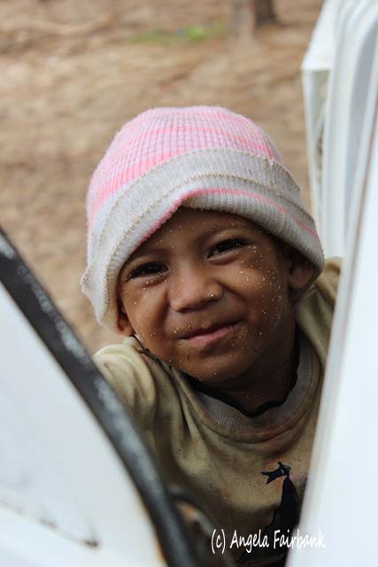 boy in hat, Nuku'alofa, Tonga, copyright Angela Fairbank