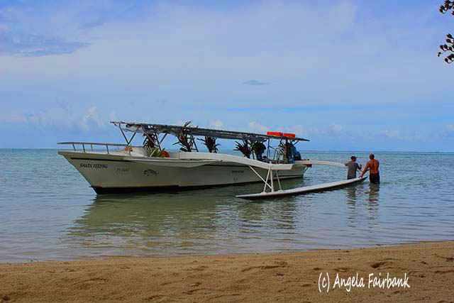 outrigger to Hana Iti Beach, Huahine, French Polynesia, copyright Angela Fairbank