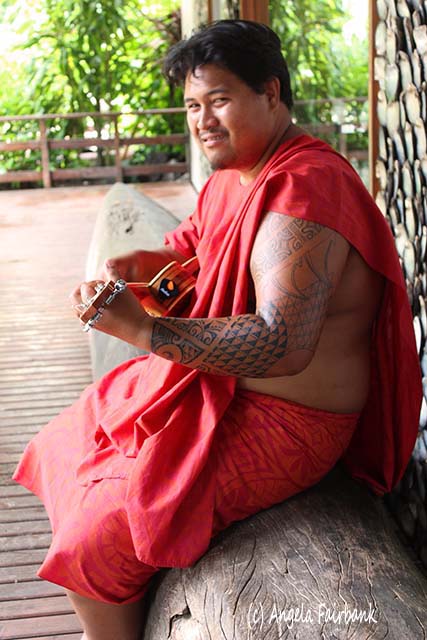 Guitarist at Tiki Theatre, Moorea, French Polynesia, copyright Angela Fairbank