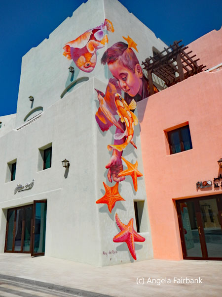boy with gold fish art
