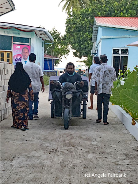 people parting on street for motorcycle