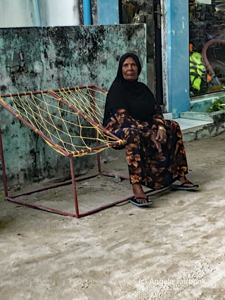 woman on coir seat