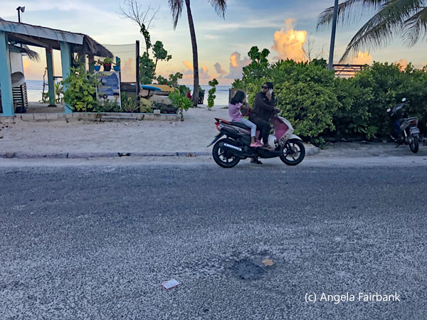 2 females on a scooter