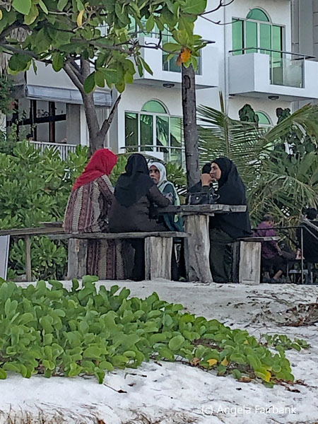 woman chatting at a table