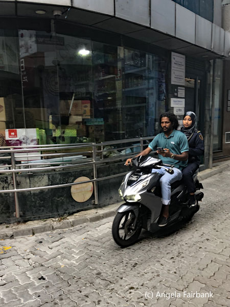 couple on scooter
