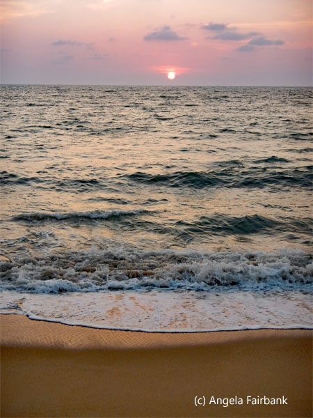 sun setting over water 2