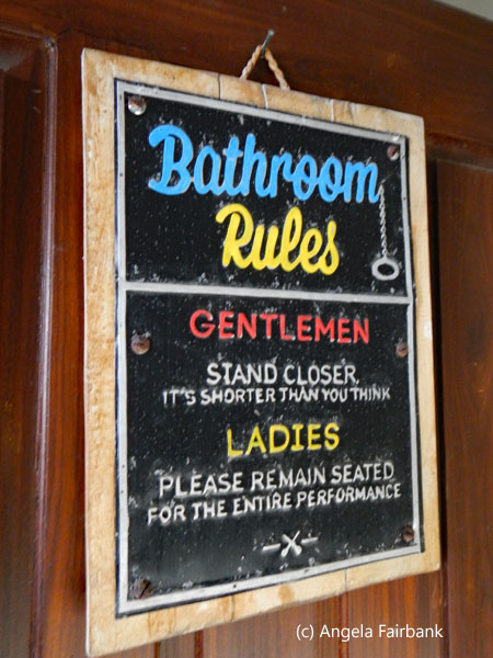 bathroom rules sign