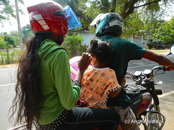 three on a motorbike