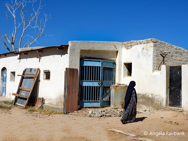 woman in front of museum building