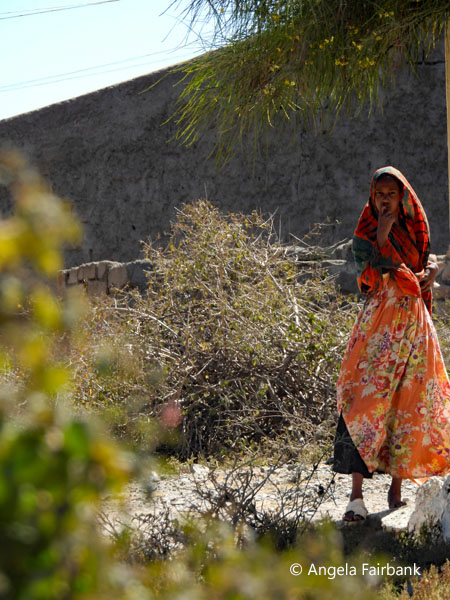 woman in ornage at Sheikh
