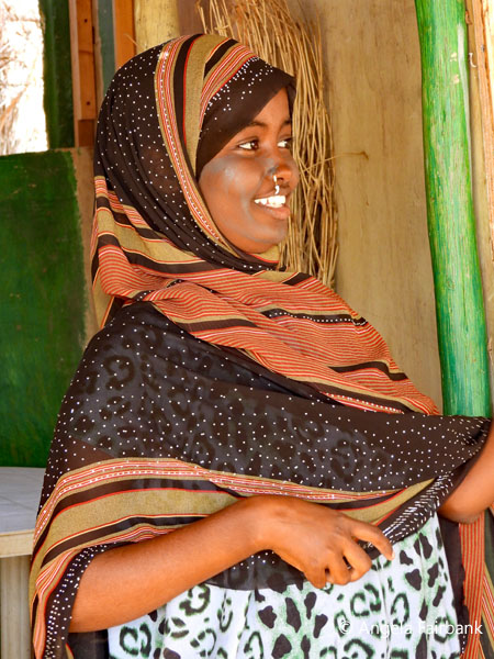 smiling girl facing right