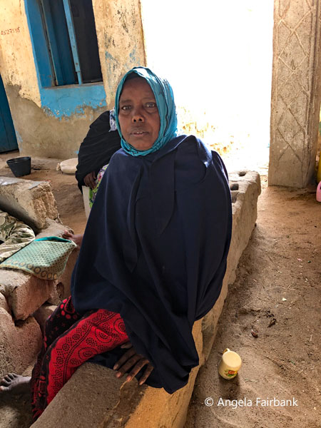 older woman seated 2