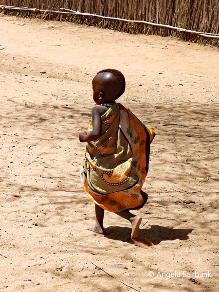 small Boya child running