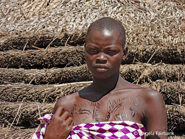 pregnant woman with chest scarification by ht