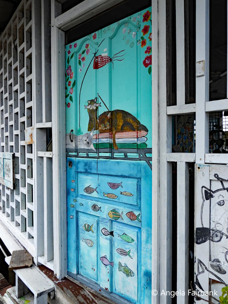 door art in stilt village