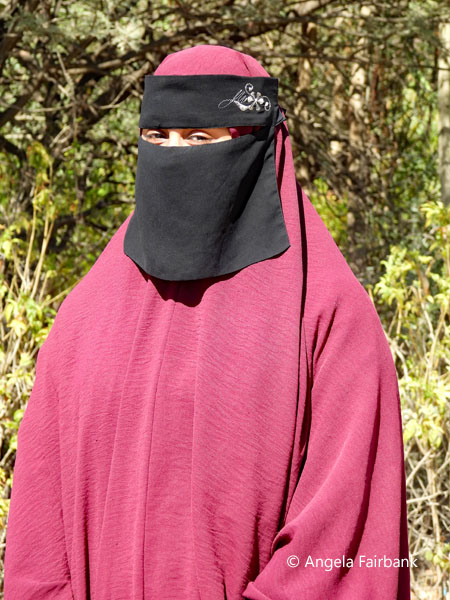 female university student in maroon