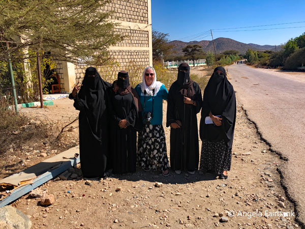 me with female university students in black