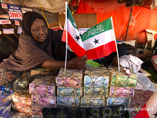 female money changer 1