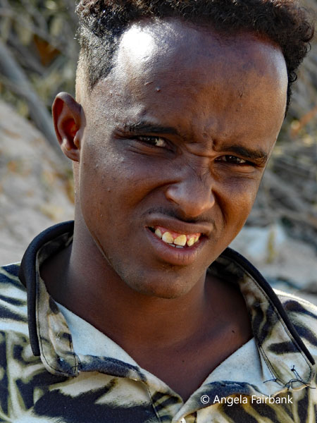 youth with furrowed brow