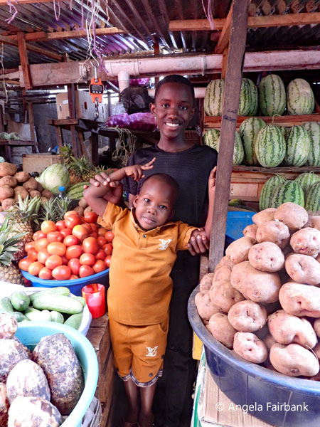 brothers at fruit and vegetables market