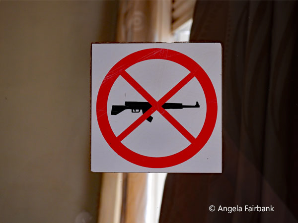 sign on entrance door of Torit Hotel