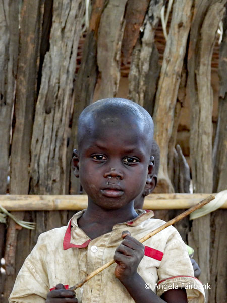 Lotuko boy with stick