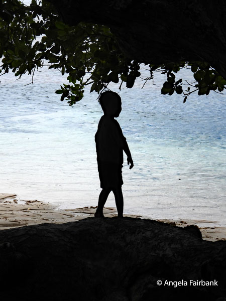 silhouette of boy at Laura beach