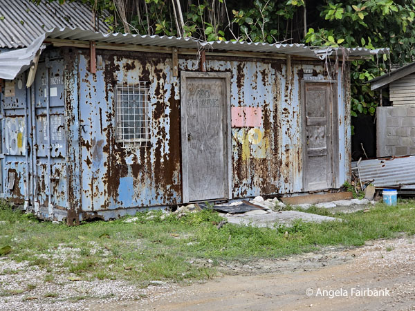 colourful shack near phosphate loading dock
