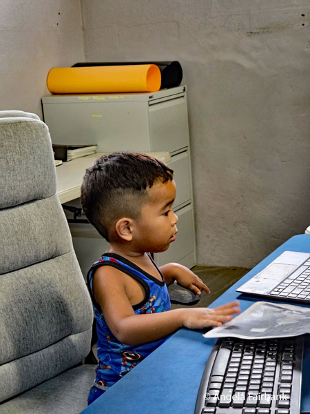 boy at museum at computer