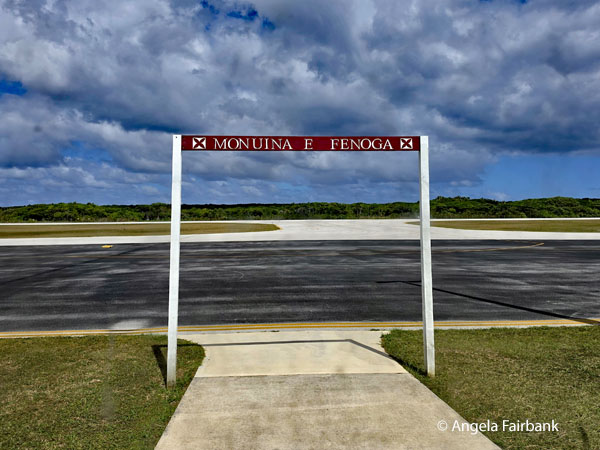 <i>Monuina e fenoga</i> sign on leaving the terminal for our plane