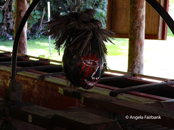 head on war canoe