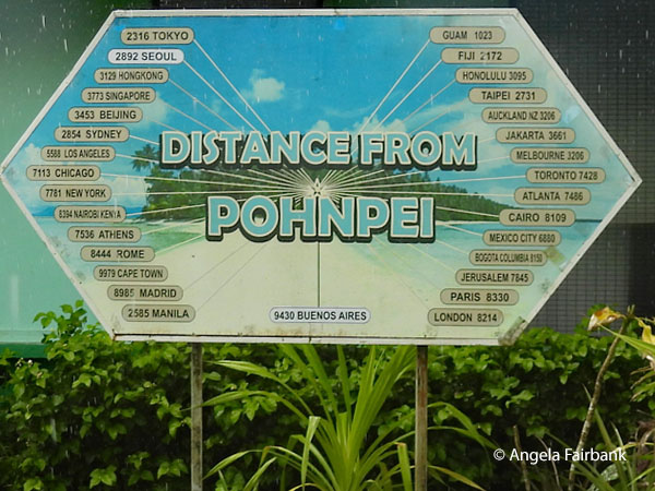 distance sign in front of tourist office