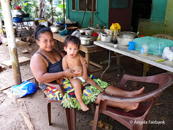 mother and child at house we passed by to get to Nan Madol