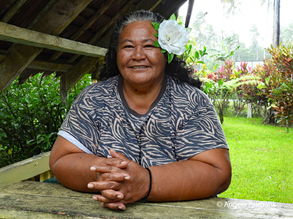 woman selling tickets to Sopoaga Falls complex