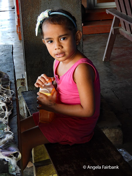 slightly older girl in market