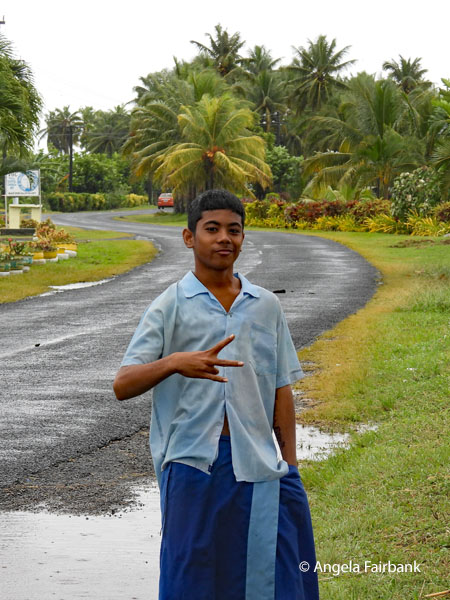 school boy on the return to Apia